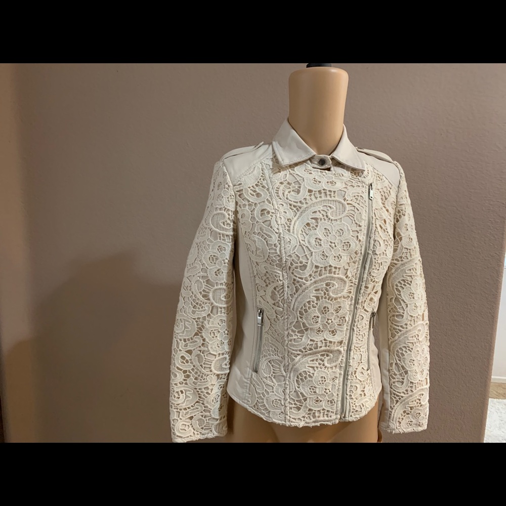 Faux leather jacket with embroidery.